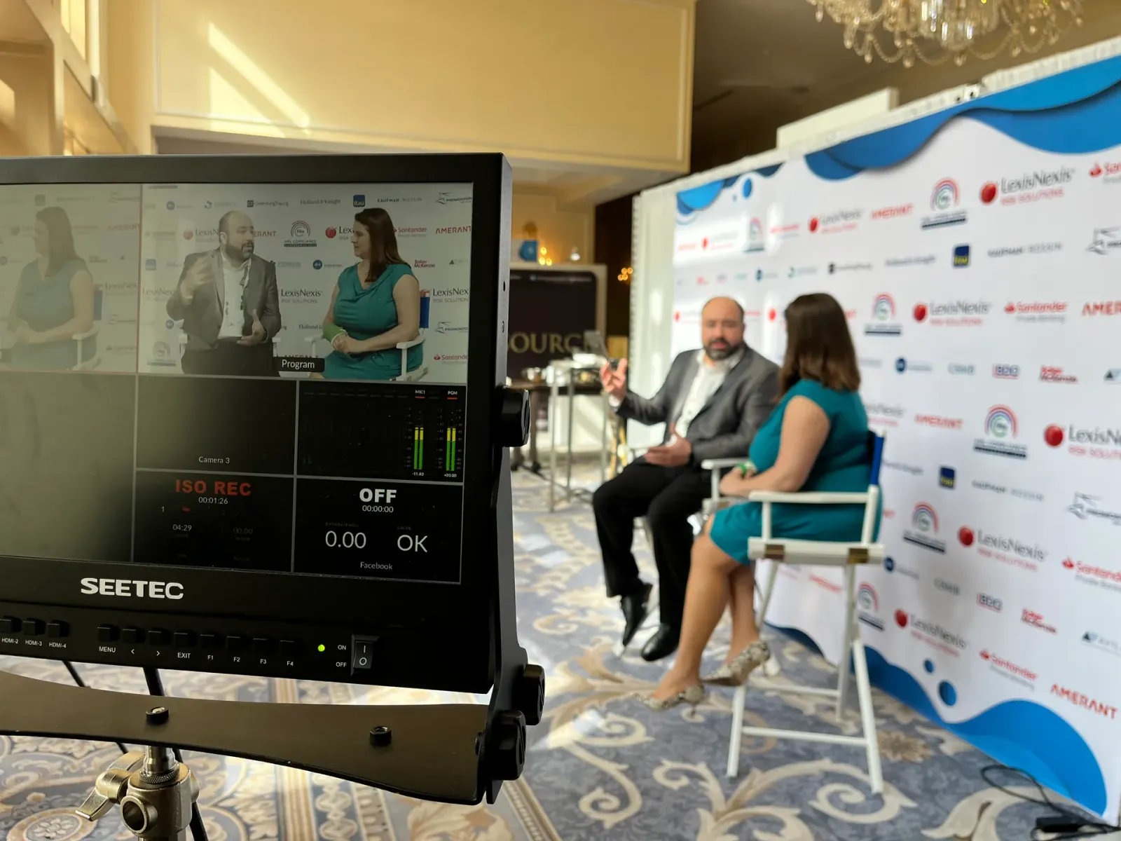 Venty Media crew filming a conference interview with multi-camera setup in Miami